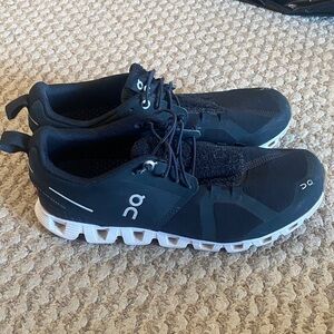 On Running Black and White Athletic Shoes